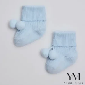 Calcetines canalé con borlas recién nacido Celeste