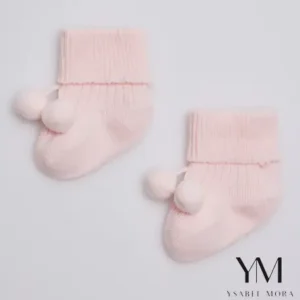 Calcetines canalé con borlas recién nacido Rosa